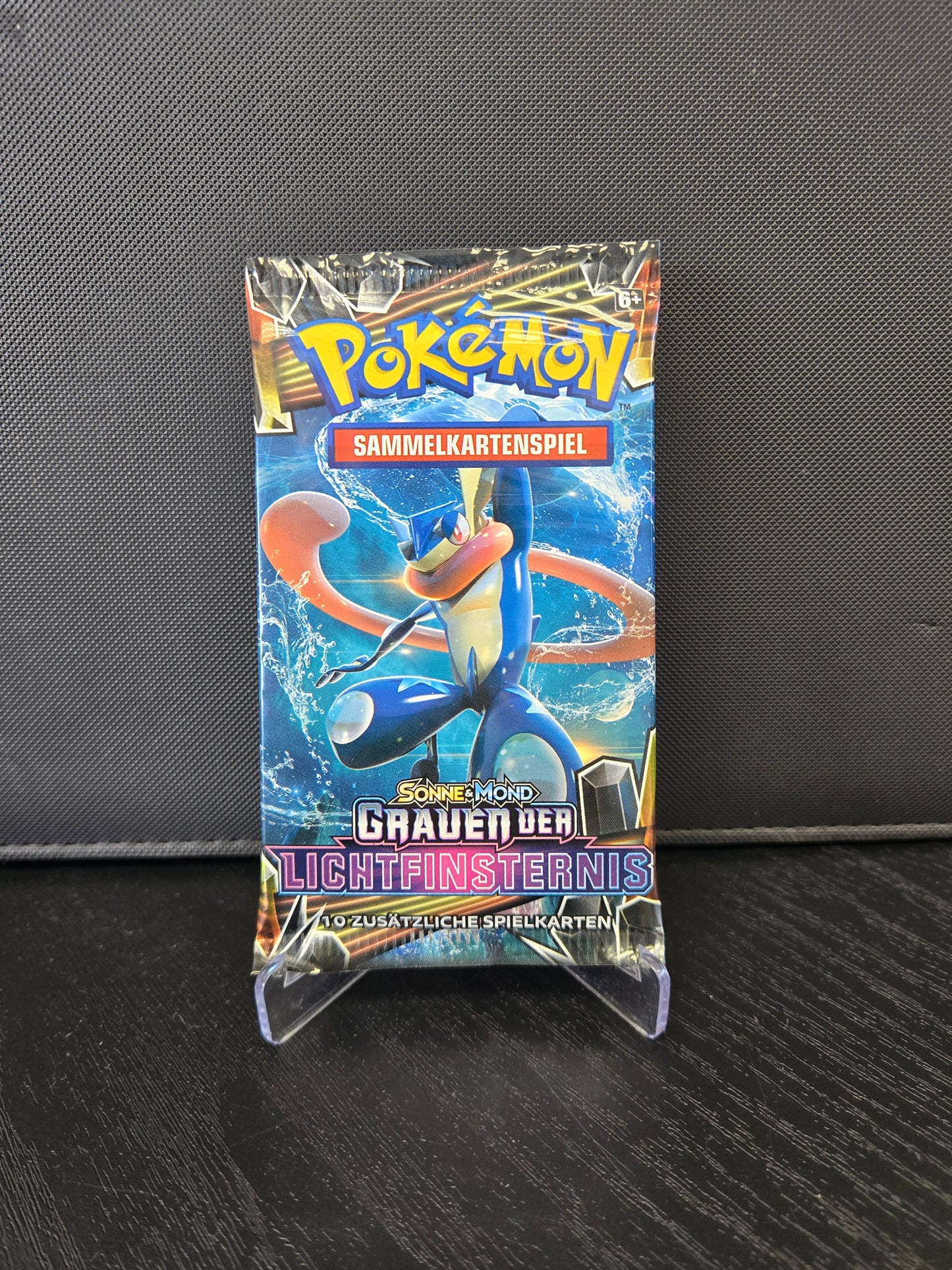 Pokémon Sonne & Mond Grauen der Lichtfinsternis Booster - 1 Stück